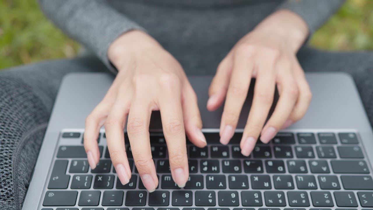 Hands Typing On Laptop Keyboard.Freelancer Internet Online Meeting Webinar.Woman Freelance With Computer Outdoors.Study Online Work Typing Email.Businesswoman Remote Working In Internet Di...